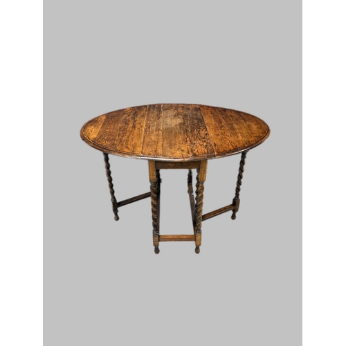 518 - Antique oak barley twist gateleg table37cm x 76cm closed 105cm x 76cm open72cm H ... 