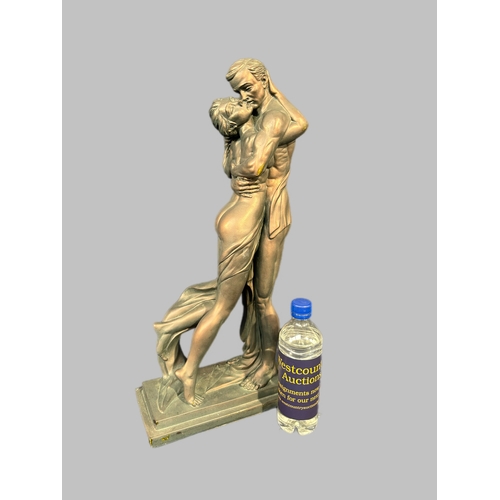 388 - Large sculpture of an embracing couple