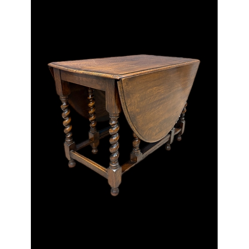 536 - Antique oak gateleg table on barley twist legs