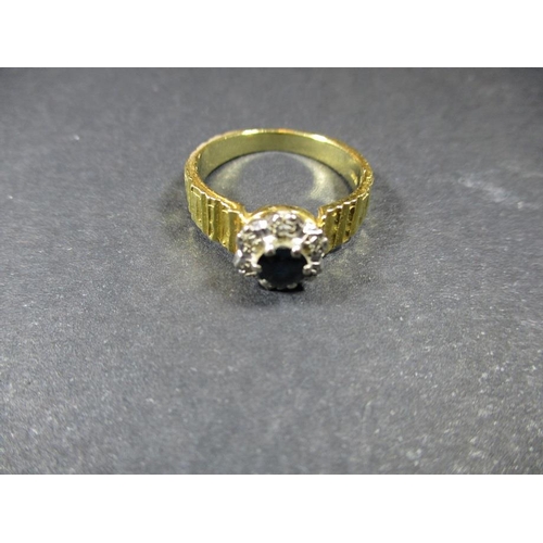 14 - An 18ct gold diamond and sapphire engagement ring, approx. ring size O