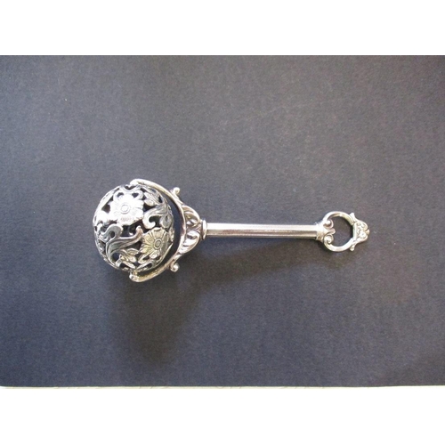 171 - A vintage white metal baby rattle