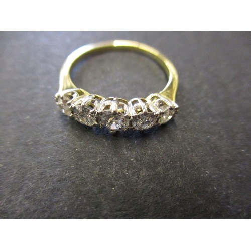 18 - An 18ct yellow gold 5 stone diamond ring, approx. ring size M