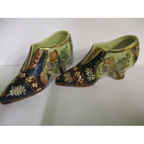 255 - Two vintage miniature oriental porcelain shoes, with polychrome tubeline decoration