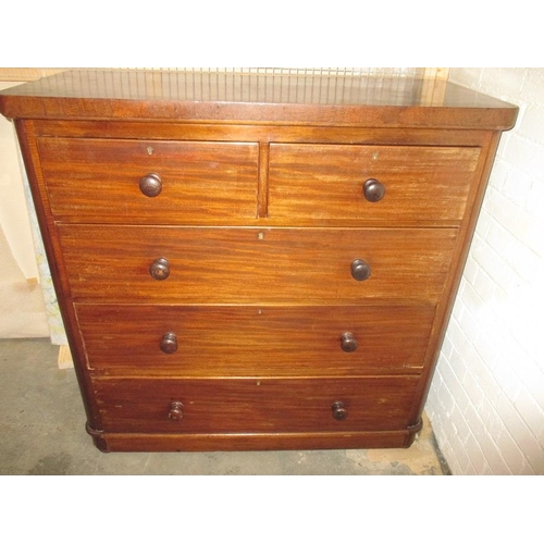 379 - A mid 19th century mahogany chest of 2 short over 3 long graduated drawers