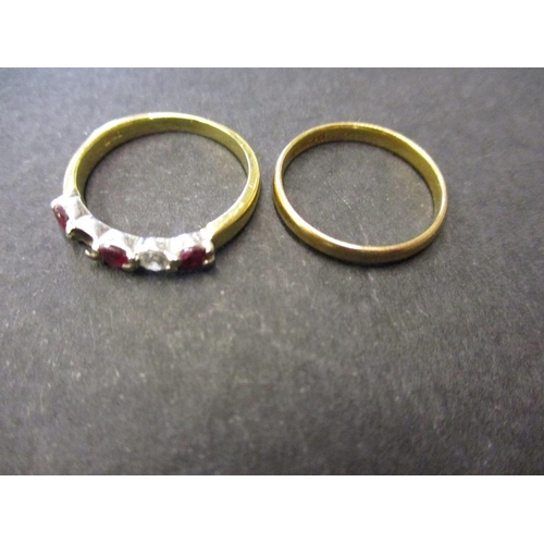 66 - A 22ct yellow gold wedding band, approx. weight 1.9g and an 18ct diamond and ruby ring