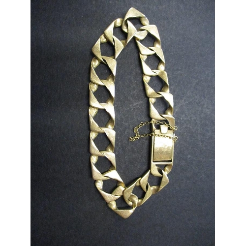 86 - A 9ct gold link bracelet, approx. weight 21.5g