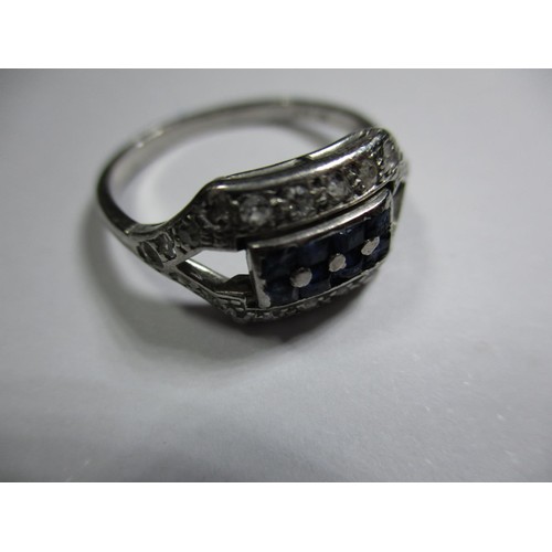 4 - An art deco platinum diamond and sapphire ring, approx ring size O
