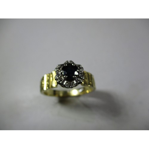 14 - An 18ct gold diamond and sapphire engagement ring, approx. ring size O
