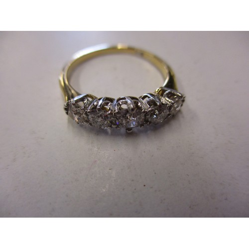 18 - An 18ct yellow gold 5 stone diamond ring, approx. ring size M
