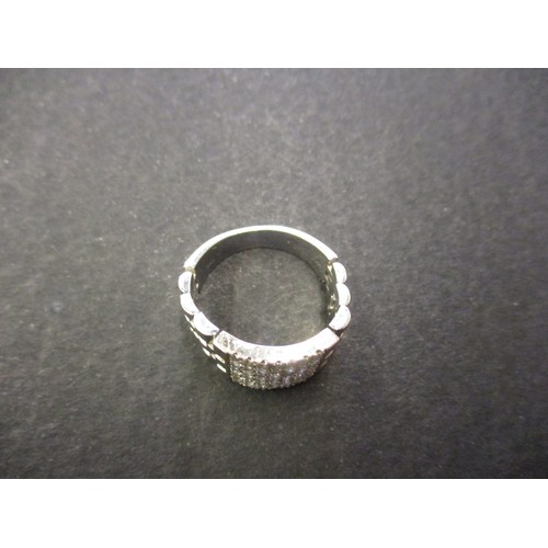 20 - An 18ct white gold ring set with multiple diamonds on a flexible head, approx. ring size O