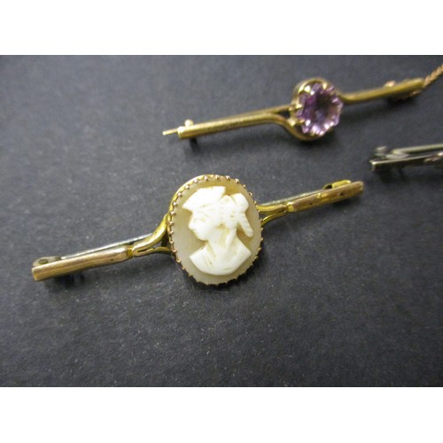 78 - Three vintage bar brooches, 2 being gold and one silver