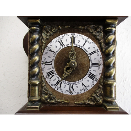 387 - A vintage wall mounted weight driven clock