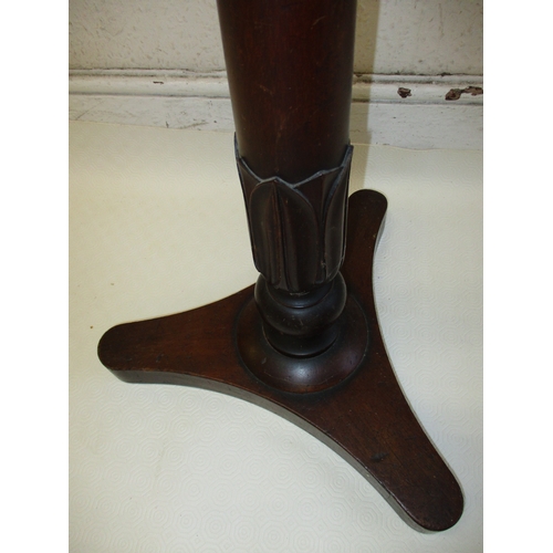 378 - A William IV mahogany music stand with twin supports on adjustable column