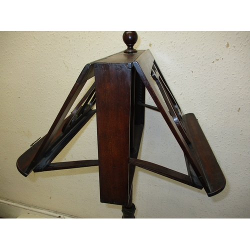 378 - A William IV mahogany music stand with twin supports on adjustable column