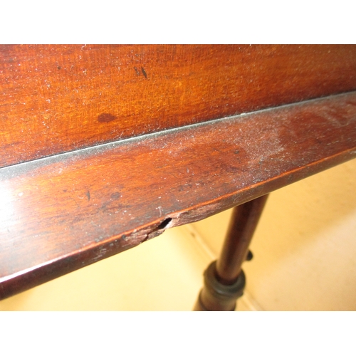 378 - A William IV mahogany music stand with twin supports on adjustable column