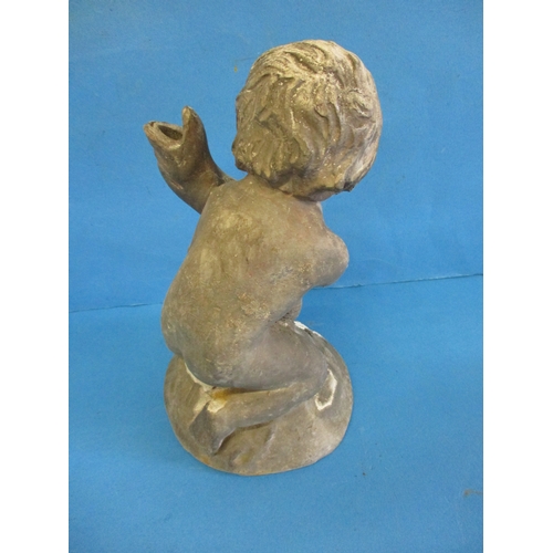 324 - An early 20th century cast lead garden pond ornament of a child holding a fish