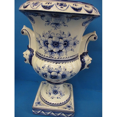 325 - A large ceramic Grecian urn style plant pot and a vase