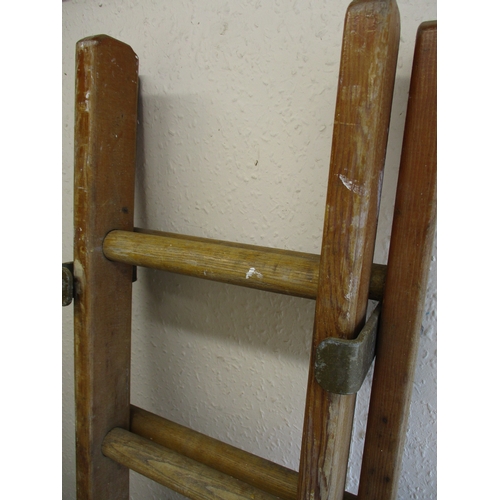 281 - A vintage British rail extending ladder, approx. closed length 184cm