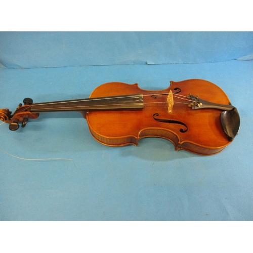 284 - An early 20th century violin in hard case with 3 bows