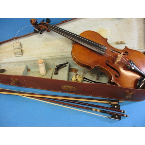 284 - An early 20th century violin in hard case with 3 bows