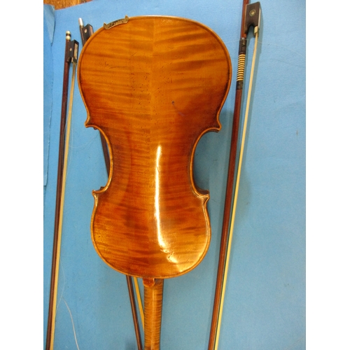 284 - An early 20th century violin in hard case with 3 bows