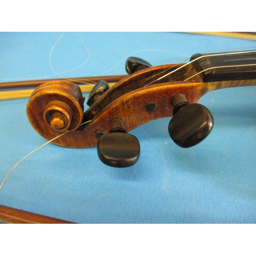 284 - An early 20th century violin in hard case with 3 bows