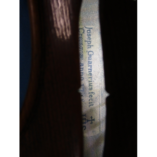 284 - An early 20th century violin in hard case with 3 bows