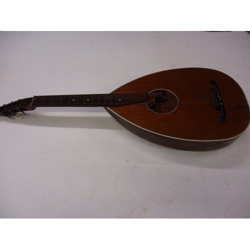 288 - A vintage lute with carved decoration