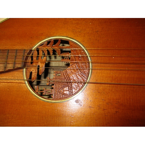 288 - A vintage lute with carved decoration