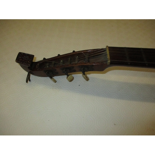 288 - A vintage lute with carved decoration