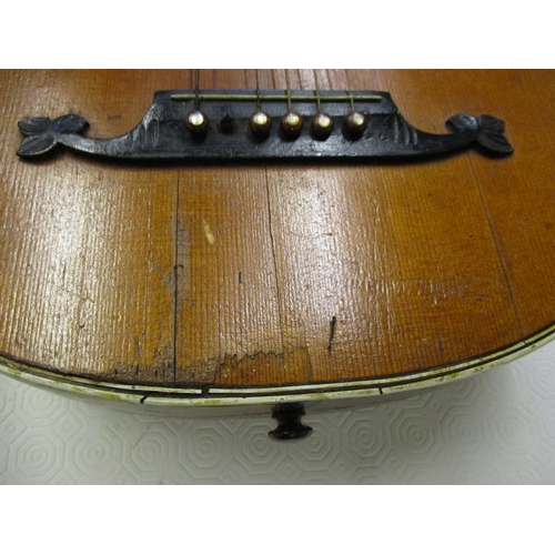 288 - A vintage lute with carved decoration