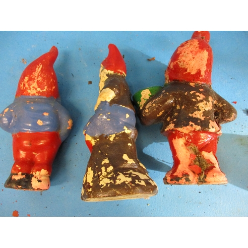 299 - Five 1920s/30s terracotta and ceramic garden gnomes