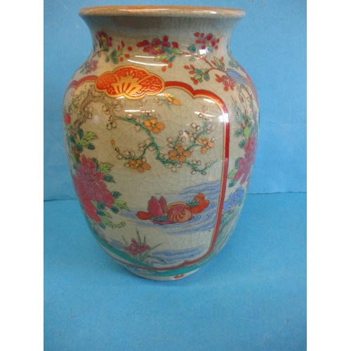 261 - A vintage oriental ceramic vase with polychrome decoration