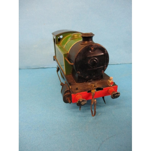 272 - A Hornby O gauge 0-4-0 clockwork tank engine No 460 and 4 waggons.