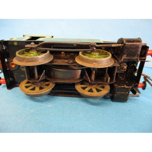 272 - A Hornby O gauge 0-4-0 clockwork tank engine No 460 and 4 waggons.