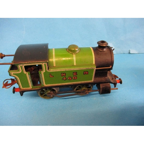 272 - A Hornby O gauge 0-4-0 clockwork tank engine No 460 and 4 waggons.