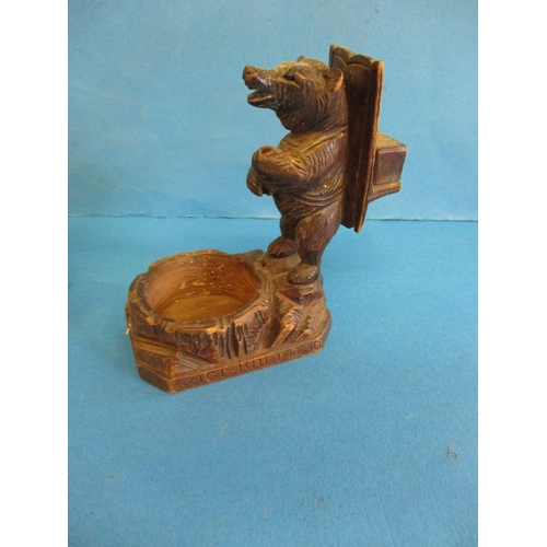 244 - 2 carved wood figures and a black forest bear match holder