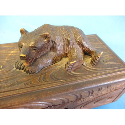 245 - A Black Forest carved wood family of bears and a trinket box