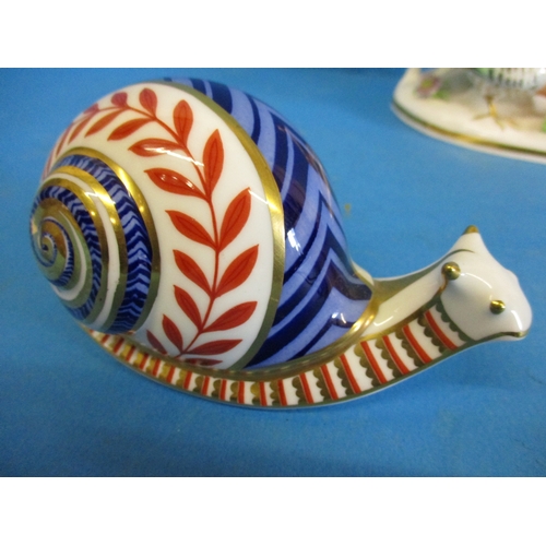 248 - A Vintage Royal Crown Derby snail and a Crown bone china group of Chinese pheasants