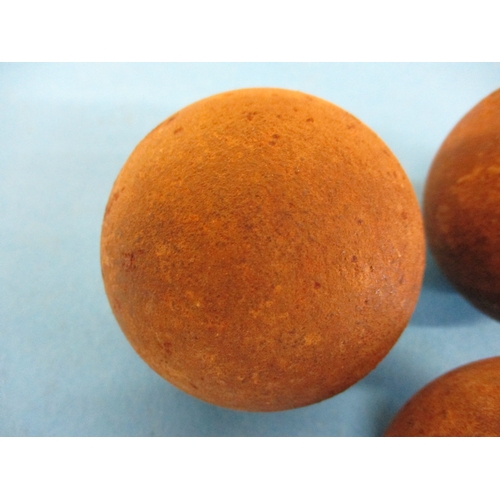 224 - 3, 19th century 2 ¼ lb cannon balls made from cast iron