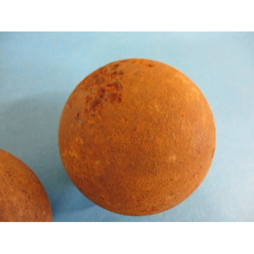 224 - 3, 19th century 2 ¼ lb cannon balls made from cast iron