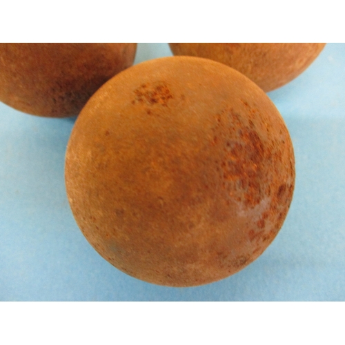 224 - 3, 19th century 2 ¼ lb cannon balls made from cast iron