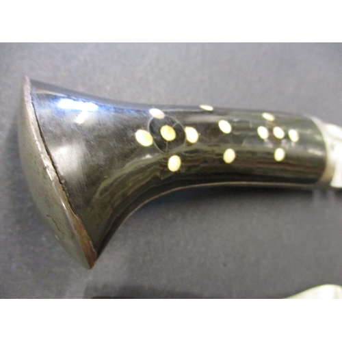 225 - A WWII Kukri with inlaid handle complete with scabbard and knives