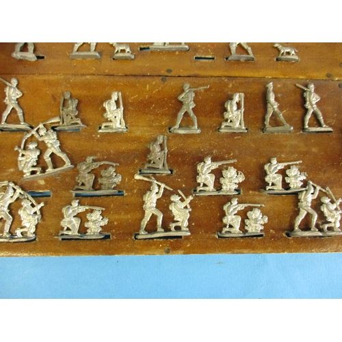 234 - A box of vintage cast lead soldiers