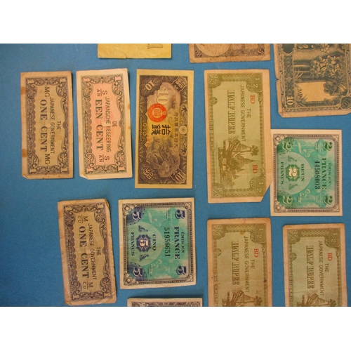 219 - A small quantity of original WW2 occupation currency banknotes.