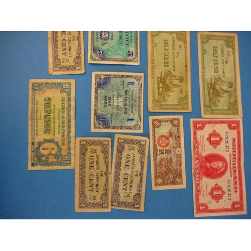 219 - A small quantity of original WW2 occupation currency banknotes.