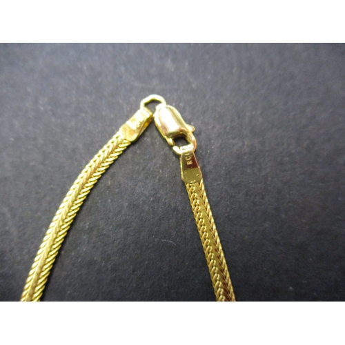 84 - A 14ct yellow gold choker style necklace with diamond set pendant