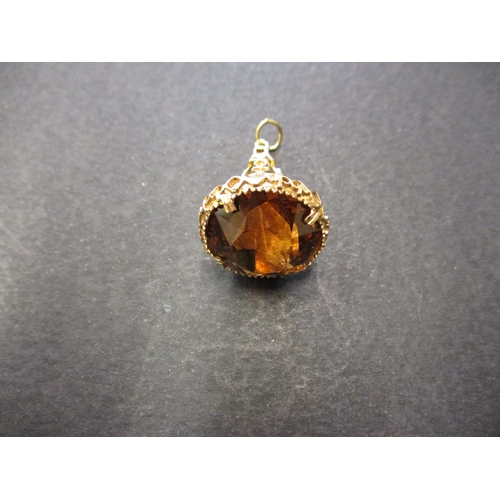 87 - A 9ct gold necklace pendant