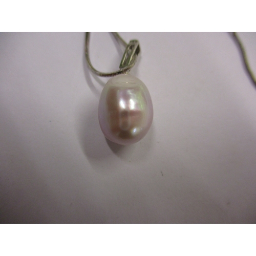 90 - A 9ct white gold necklace, with a diamond and tear drop pearl pendant.