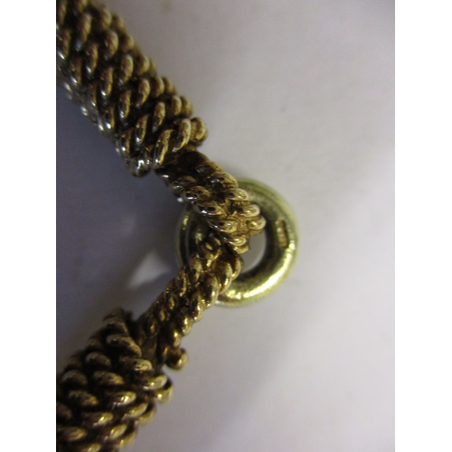 99 - A 9ct gold twisted rope bracelet, with padlock clasp, Approximate weight 52.8g.